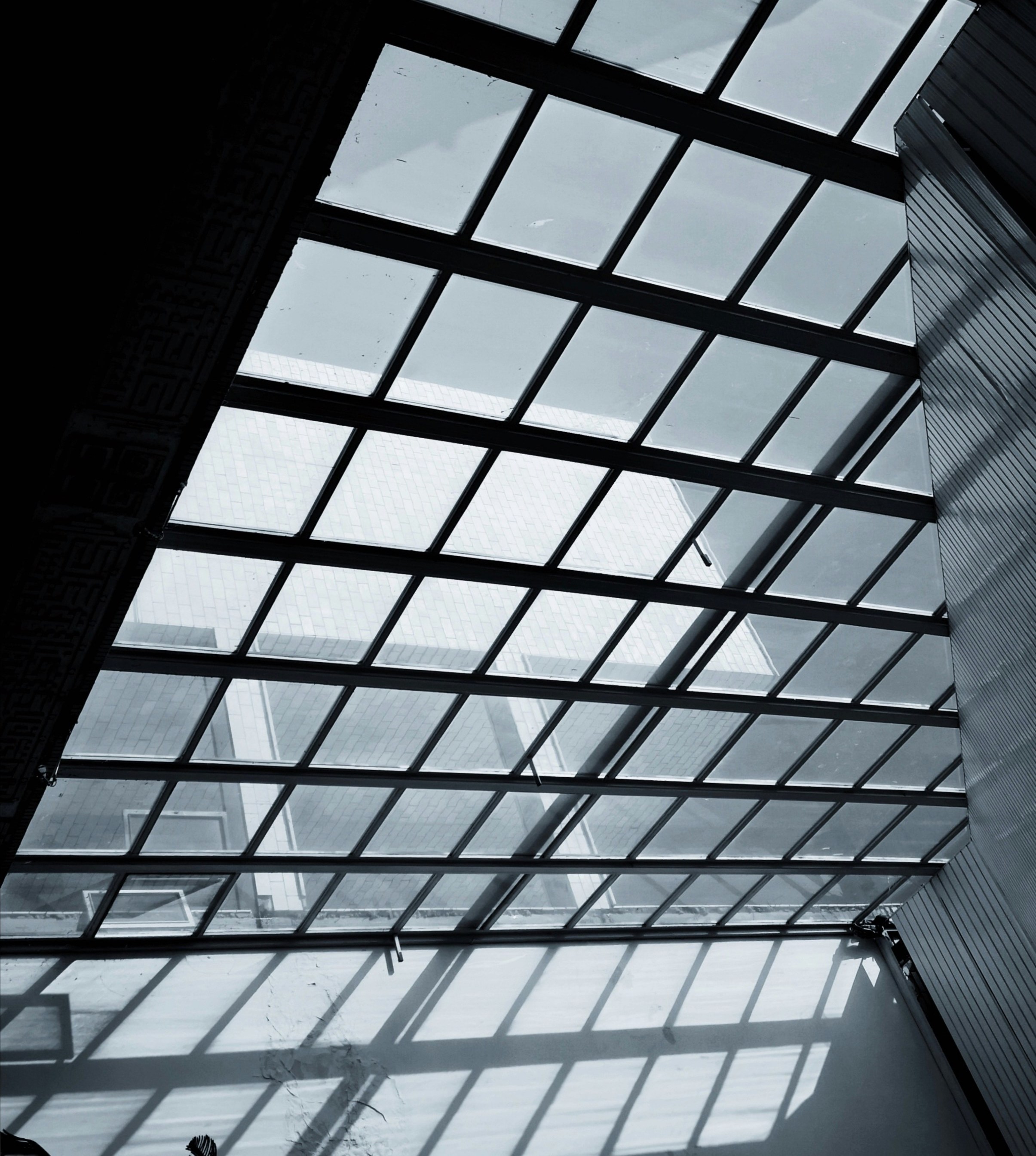 Professionally installed solar film on a commercial building in Cincinnati, Ohio